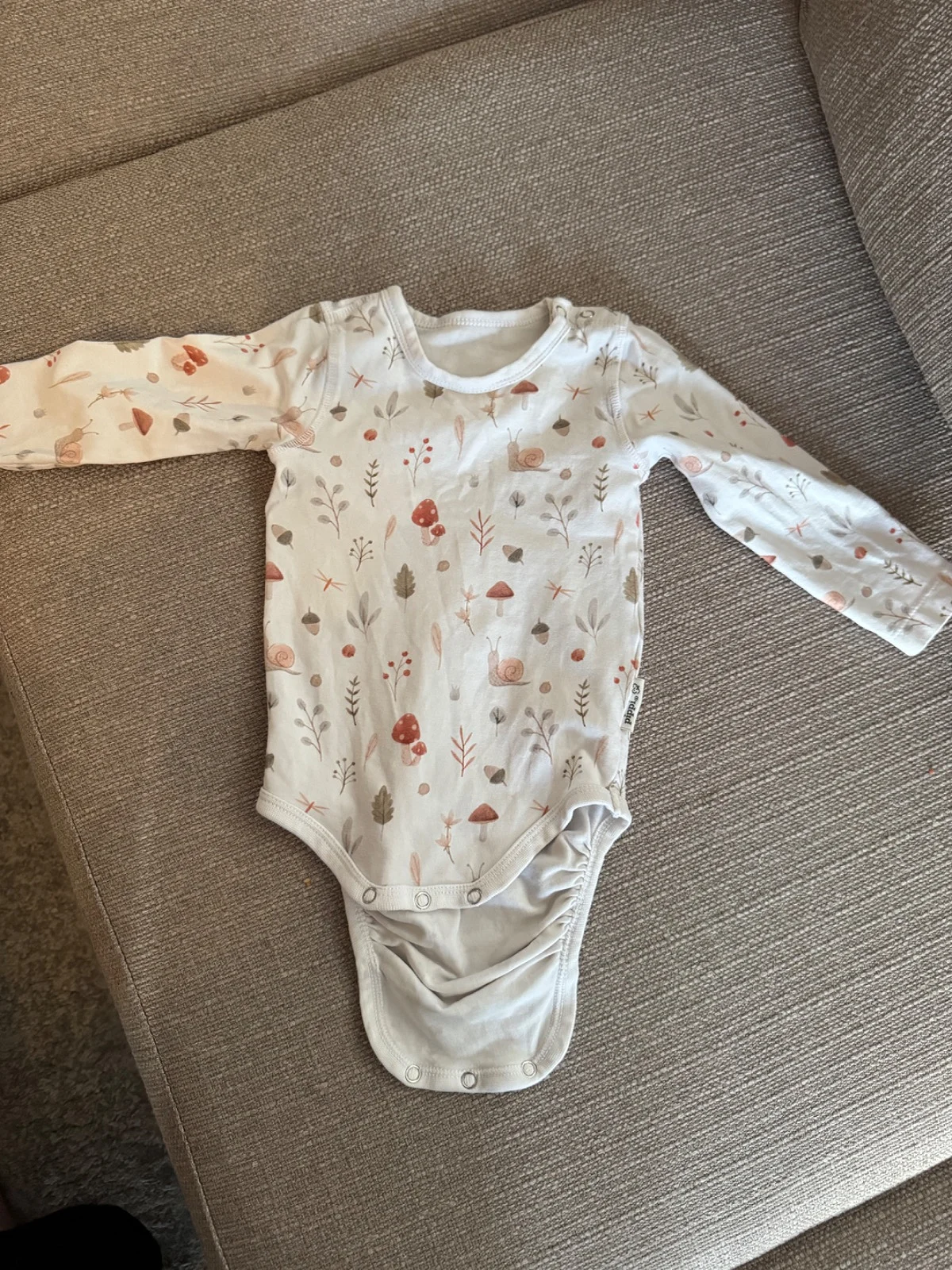 Pippi vaalea kuosillinen pitkähihainen body 62/68